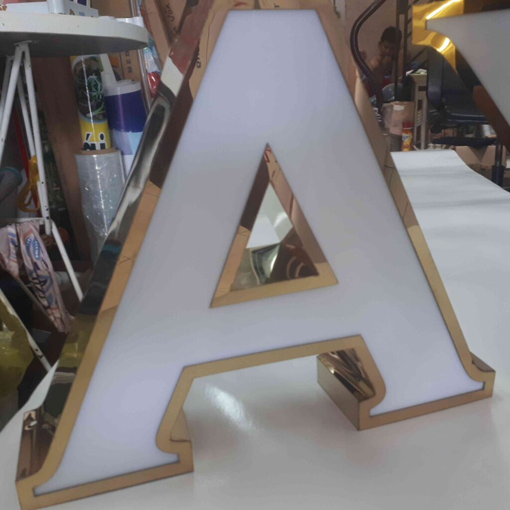 Quảng cáo Tài Long An Chữ inox vàng